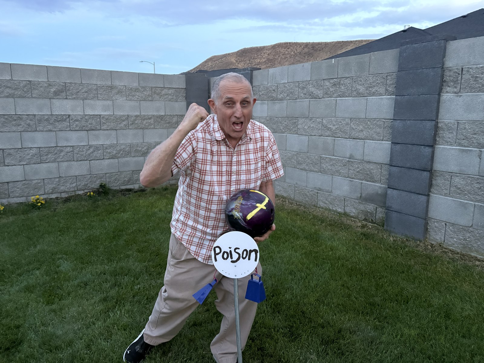 The creator of Bola, mid-celebration with a Poison bola in hand.